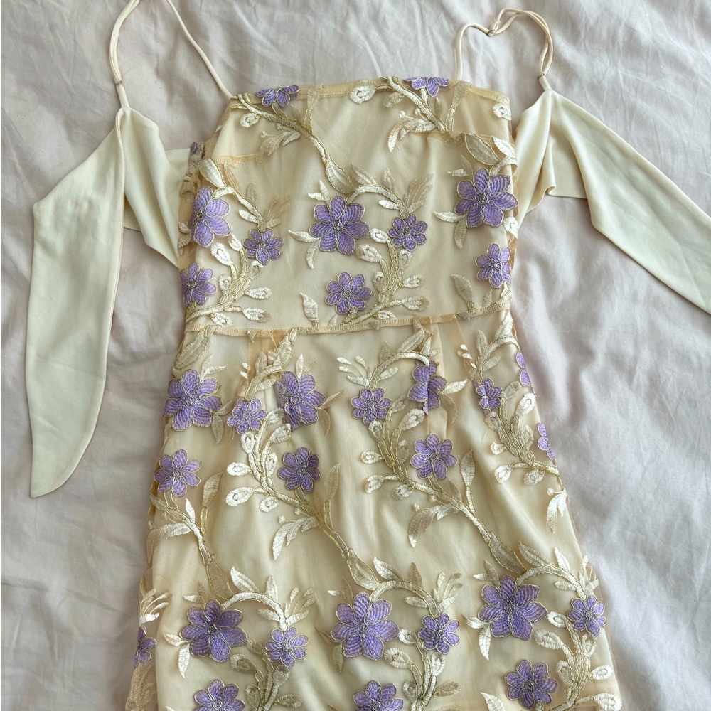 Purple flowers, yellow dress
